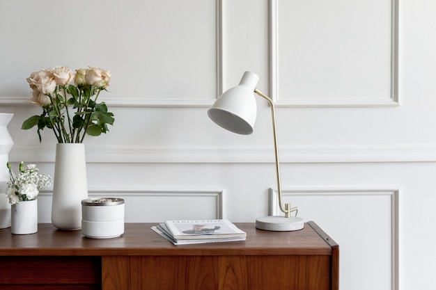 Wooden table against a white wall