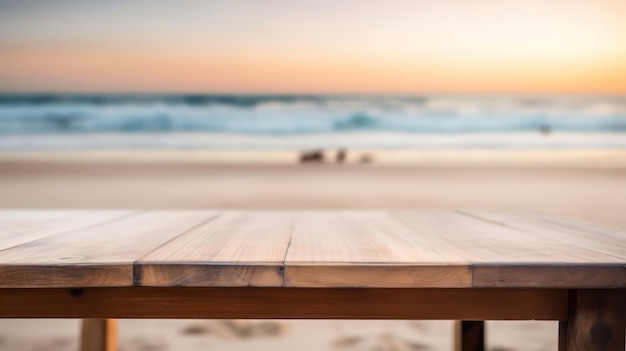 A wooden table on a beach with a sunset in the background