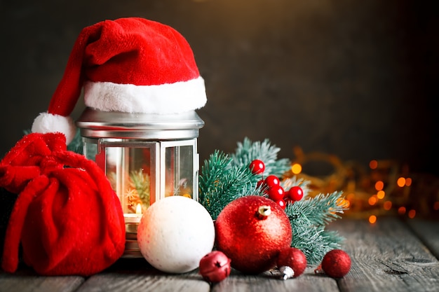 Wooden table decorated with Christmas gifts  