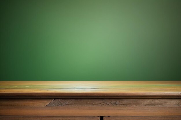 Wooden table on green background