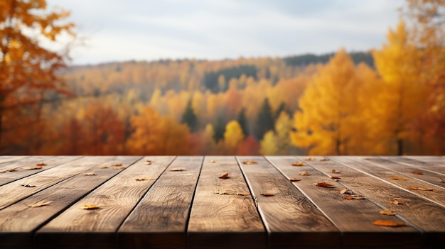 Wooden table with autumn leaves on the background