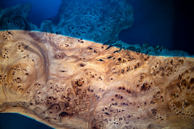 Wooden table with a blue edge.