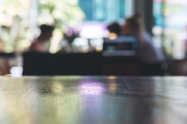 wooden table with blur bokeh background