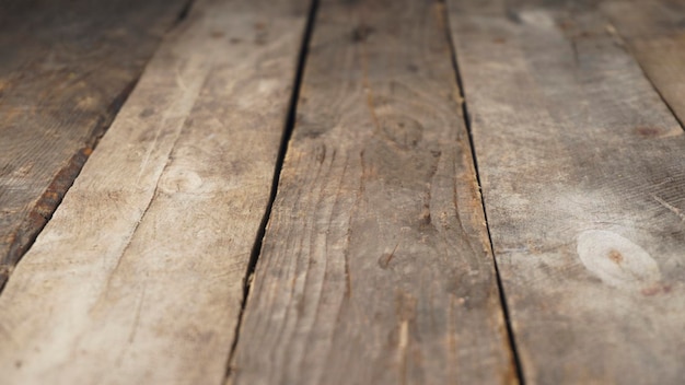 A wooden table with a dark brown and white color.