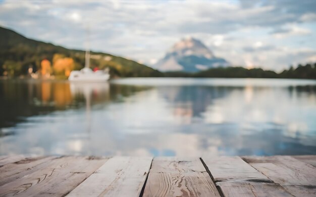 Photo wooden table with a defocussed image of a boat on a lake photo