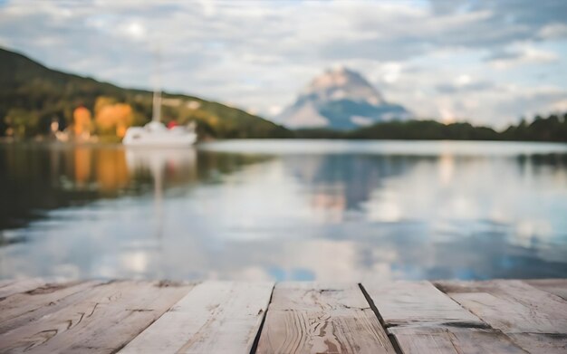 Wooden table with a defocussed image of a boat on a lake photo