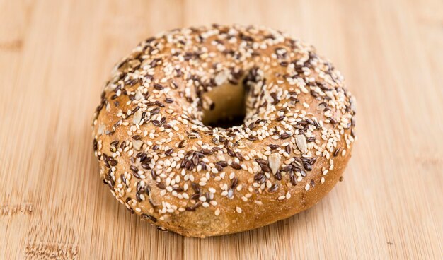 Wooden table with fresh baked wholemeal Bagels