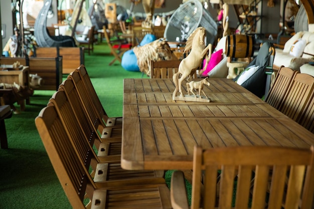 A wooden table with a horse on it