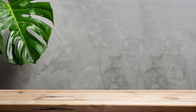 Wooden table with tropical leaves in the background empty wooden table for product display