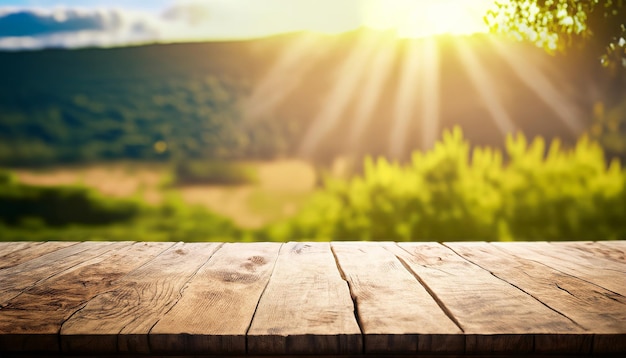 A wooden table with a view of a mountain and the sun