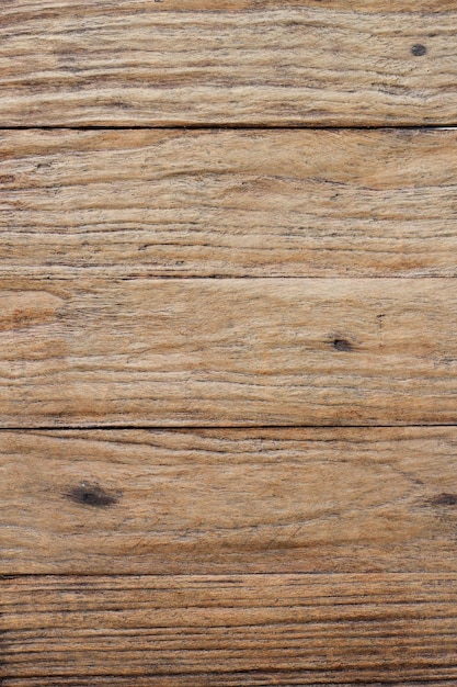 A wooden table with a wooden surface that has a wooden texture.