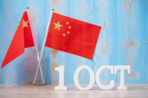 Wooden text of october 1 with with china flags national day of the people's republic of china public nation holiday day and happy celebration concepts