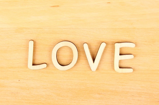 Wooden text quotLovequot Letters on a wooden background