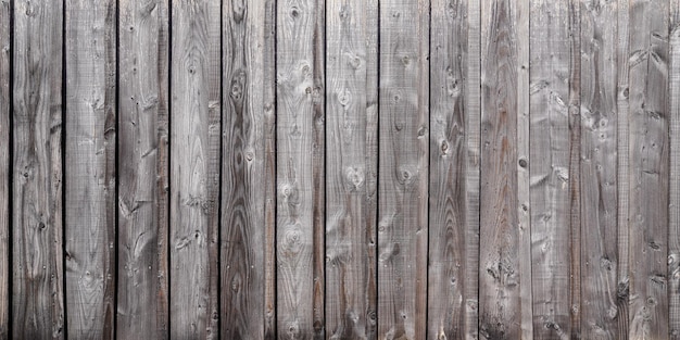 Деревянная текстура старого выветренного деревянного фона из досок натурального коричневого цвета