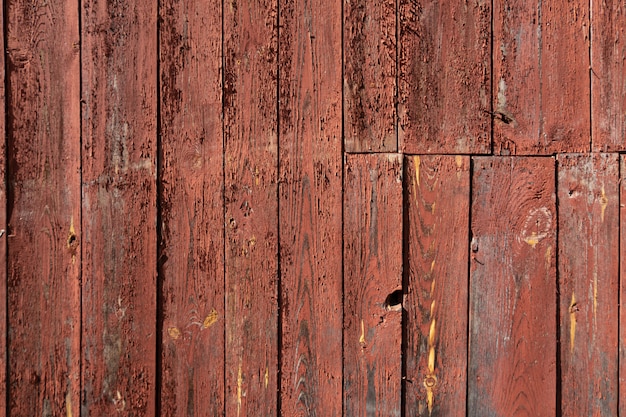 Wooden texture of red color background