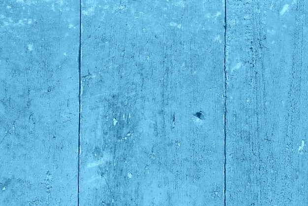 Wooden texture with scratches and cracks. It can be used as a background