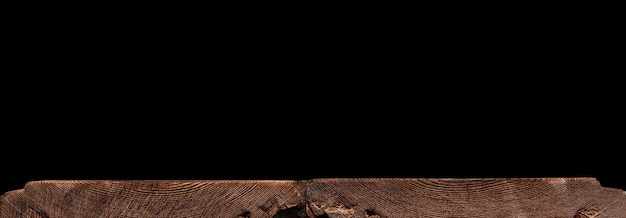 Wooden textured surface on a black background