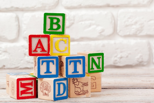 Photo wooden toy blocks with the text: abc