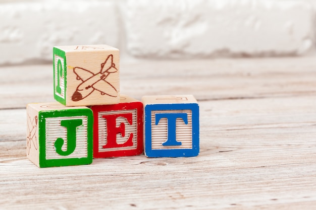 Wooden toy Blocks with the text: jet