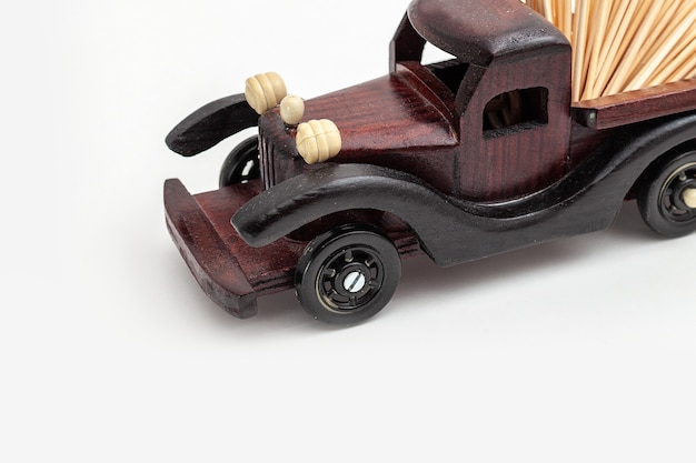 Photo wooden toy car isolated on white background