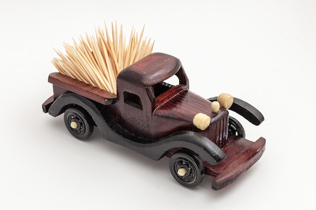 Wooden toy car isolated on white background