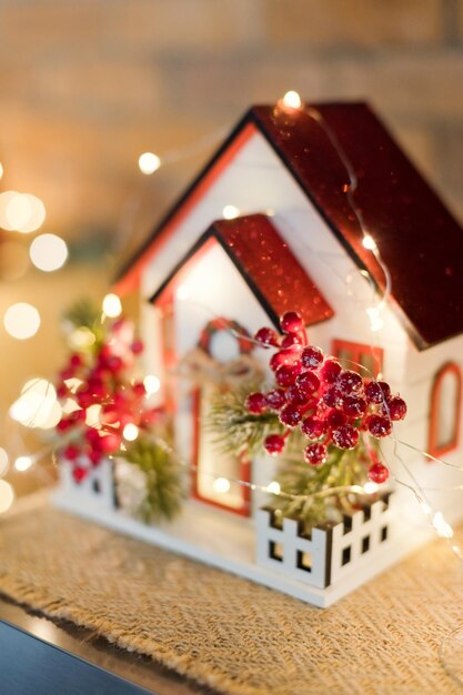 Wooden toy house and Christmas lights