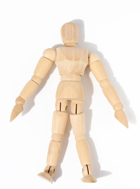 Wooden toy mannequin marionette on a white background