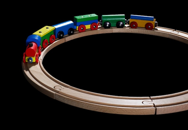 wooden toy train on tracks