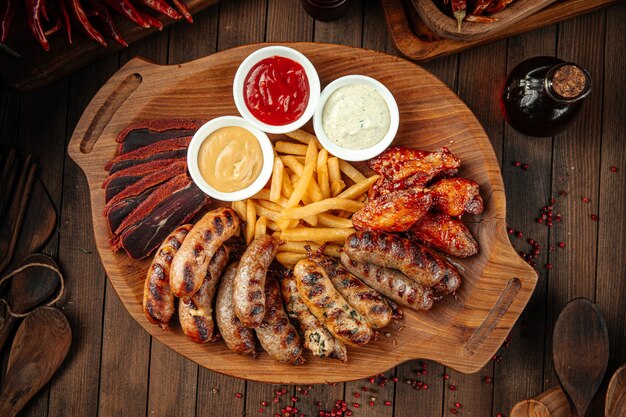 Wooden tray of beer appetizers set assortment