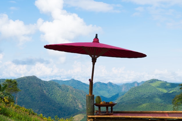 Wooden umbrella on balcony