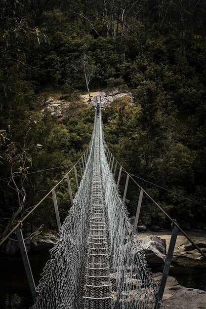 Wooden walking bridge over a river