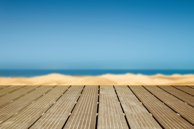 Wooden walkway with a view of the dunes and the sea