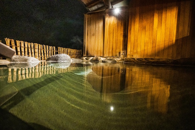 A wooden wall with a wooden door that says'the word spa'on it