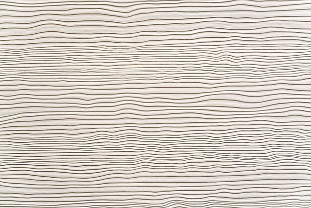 Wooden white wall with embossed stripes