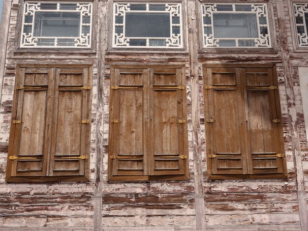 Wooden window shutters in the historic building.