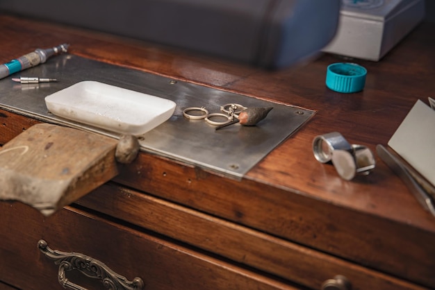 Wooden work table and jeweler's tools