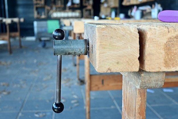 Wooden workbench in empty in carpentry workshop classroom