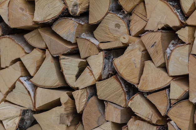 Woodpile - firewood for the winter, design or texture - telephoto shot