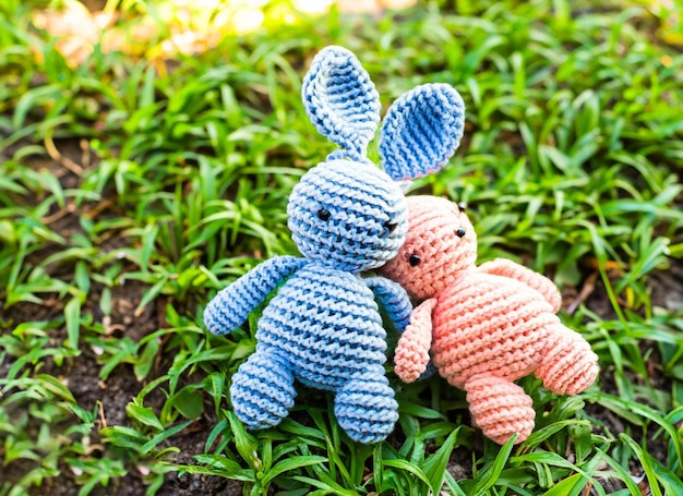 Wool amigurumi in the garden rabbit red heart