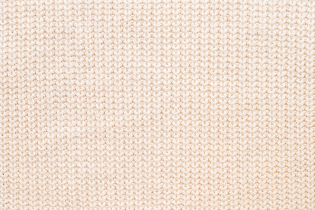 Wool beige sweater texture