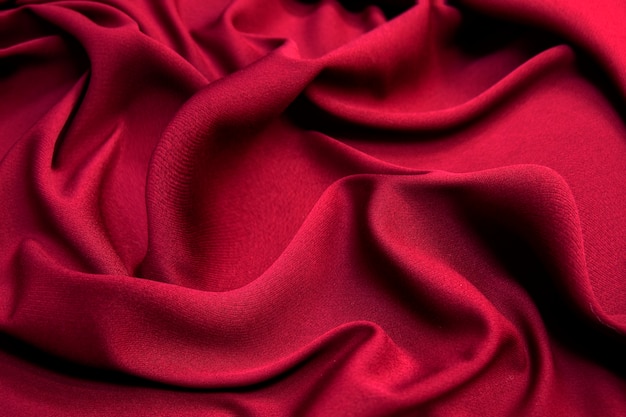 Wool fabric. The color is red. Texture, background, pattern.