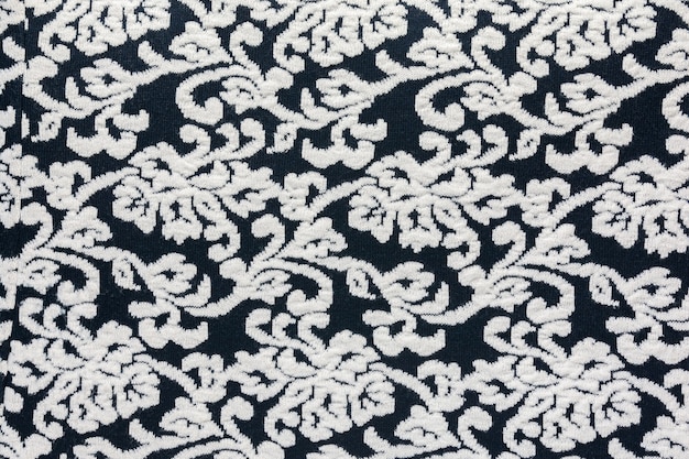 Photo woolen fabric with an abstract pattern in black and white as a natural background