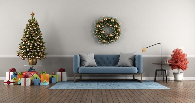 Woonkamer in klassieke stijl met kerstboom met kleurrijk cadeau en blauwe bank -3D-rendering