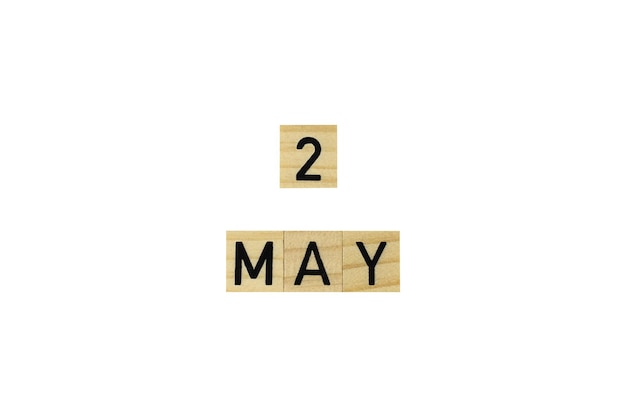 The word 2 may in wooden letters on a white backgroundtext congratulation spring holidayspace