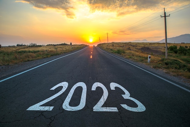 The word 2023 written on highway road