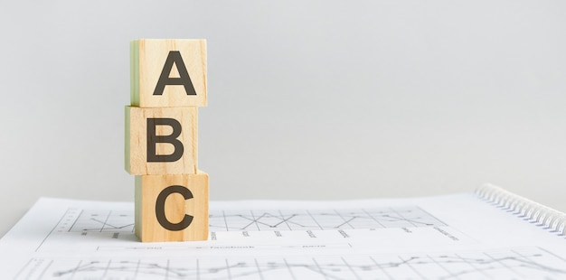 The word ABC structured query language, lined with wooden blocks.