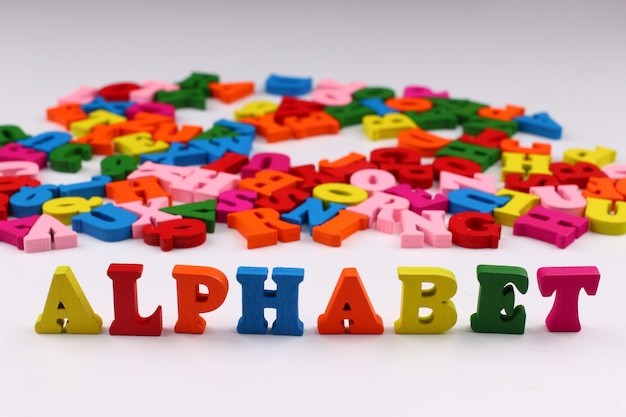 The word alphabet with colored letters