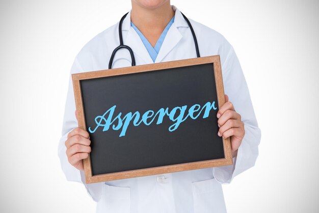 Photo the word asperger against doctor showing little blackboard