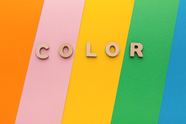 Word Color on bright colorful background. Rainbow spectrum, joy concept