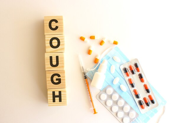 The word cough is made of wooden cubes